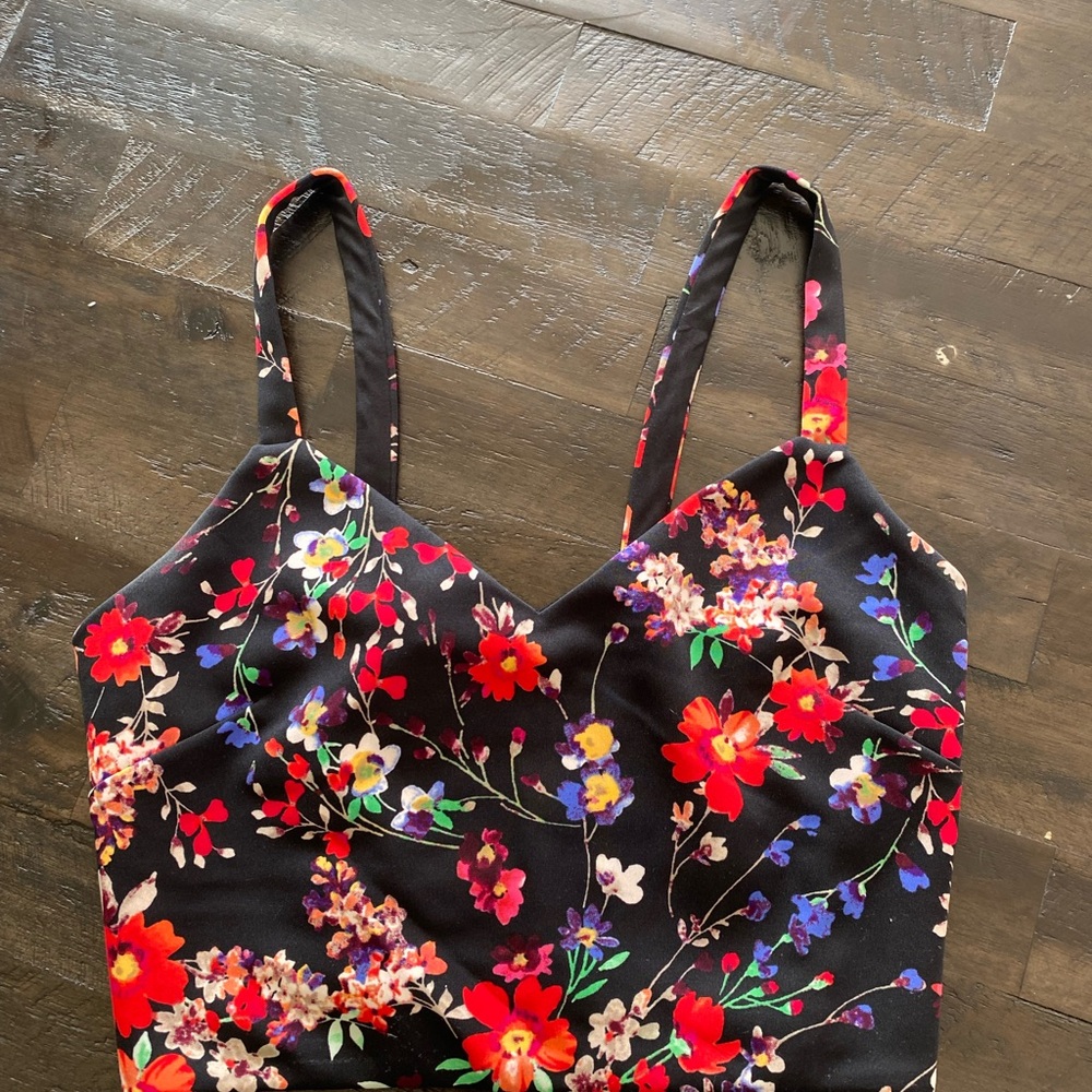 Vibrant Black and Red Floral Backpacks